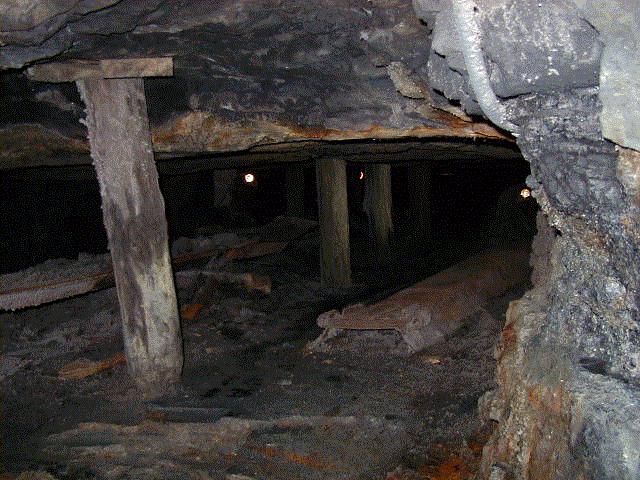 Looking up-dip into a room which contains a shaker-conveyor.