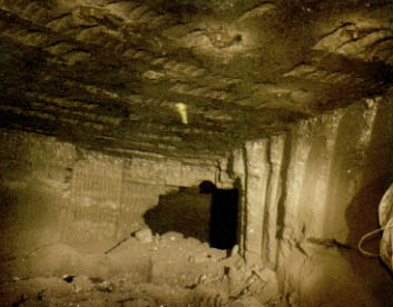 A hole made by the continuous miner, where it has just broken through into another room within the mine.