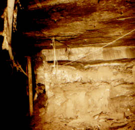 The corner of a thick pillar, showing bedded structure in the coal