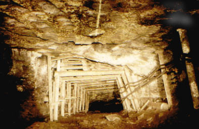 An exemplary job of timbering, supporting a roadway as it passes down through a fault